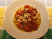 Tomaten und Feta in Oliven-Kräuter-Öl - Rezept