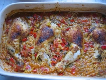 Hähnchenkeulen mit Paprikareis im Ofen - Rezept