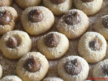 Rezept: PLÄTZCHEN: Haselnussplätzchen mit Nougathaube Bild Nr. 3 PLÄTZCHEN: Haselnussplätzchen mit Nougathaube - Rezept - Bild Nr. 3