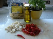 Tagliatelle al Basilico con mozzarella e pomodore - Rezept