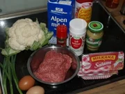 Blumenkohl unter einer Käsehaube auf Hackfleischbett - Rezept