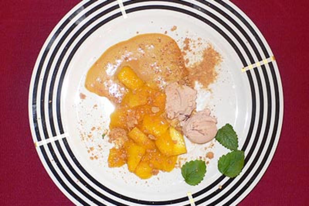 Bilder für Flambierte Mango mit Whiskey-Cream-Zabaione und Amarettini-Crunch - Rezept