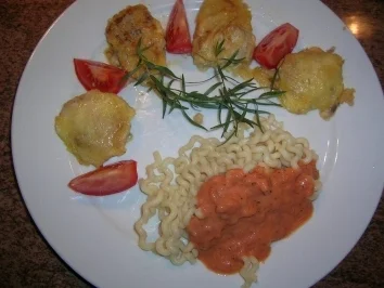 Schweinefiletmedaillons in der Käsekruste mit Fusilli Lunghi und Tomatensauce - Rezept