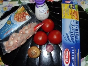 Rezept: Spaghettitürmchen mit Rießengarnelen auf Tomaten-Sahnesugo Bild Nr. 2 Spaghettitürmchen mit Rießengarnelen auf Tomaten-Sahnesugo - Rezept - Bild Nr. 2