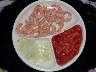 Rezept: Spaghettitürmchen mit Rießengarnelen auf Tomaten-Sahnesugo Bild Nr. 3 Spaghettitürmchen mit Rießengarnelen auf Tomaten-Sahnesugo - Rezept - Bild Nr. 3