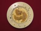 Piroggen auf einer Käse-Lauch-Soße - Rezept