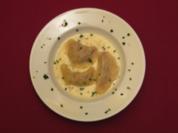 Piroggen auf einer Käse-Lauch-Soße - Rezept