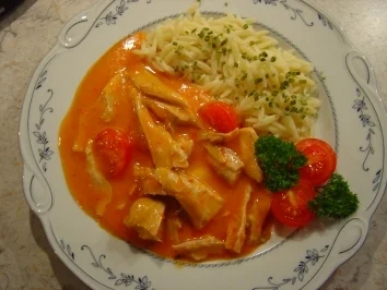 Putengoulasch aus Putenflügeln... kalorienarm... mit Tomate und Paprika - Rezept