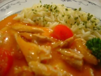 Putengoulasch aus Putenflügeln... kalorienarm... mit Tomate und Paprika - Rezept - Bild Nr. 2