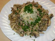 Champignongeschnetzeltes mit Tiroler Speckknödel - Rezept