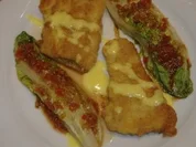 Gedünstete Salatherzen mit gebr.Fischfilet und Zitronenschaum - Rezept