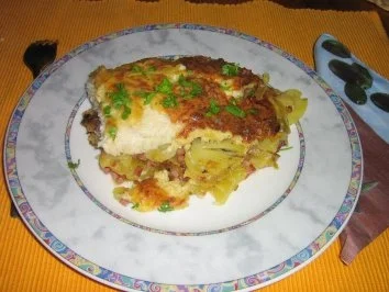 Rezept: Fischfilet auf Bratkartoffeln unter einer Senf-Käse-Kruste Fischfilet auf Bratkartoffeln unter einer Senf-Käse-Kruste - Rezept