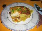 Fischfilet auf Bratkartoffeln unter einer Senf-Käse-Kruste - Rezept