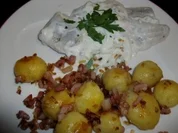 Sahne Hering mit Pellkartoffeln und Speck - Rezept