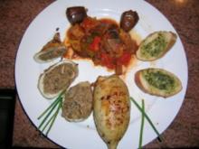 Tintenfischtuben gefüllt mit Thunfisch+schwarzem Olivenpesto an Ratatouille und Kräuterbaguette - Rezept