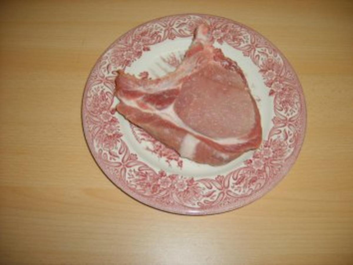 Paniertes Kotelett mit Erbsen und Möhrchen - Rezept - Bild Nr. 2