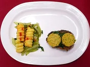 Iberischer Schweinerücken mit Cafe-de-Paris-Butter und sautiertem Salat - Rezept