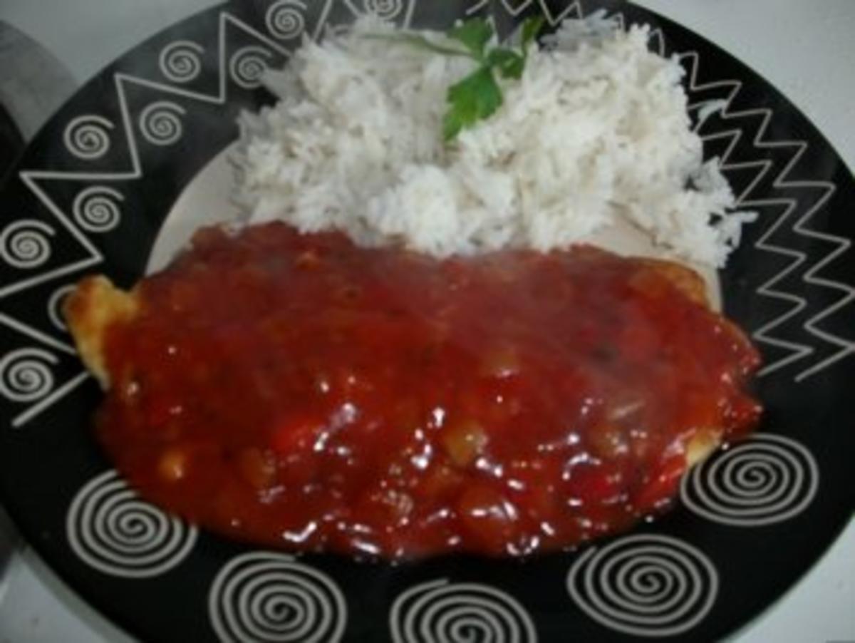 Putenschnitzel mit Teufelssauce und Reis - Rezept - kochbar.de