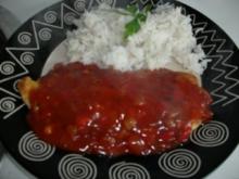 Putenschnitzel mit Teufelssauce und Reis - Rezept