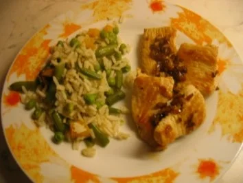 Knoblauch Putenschnitzel mit Gemüsereis - Rezept