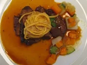 Geschmorte Kalbsbäckchen mit Croustillant vom Kalbsbries an Steinpilzen und Trüffeljus - Rezept