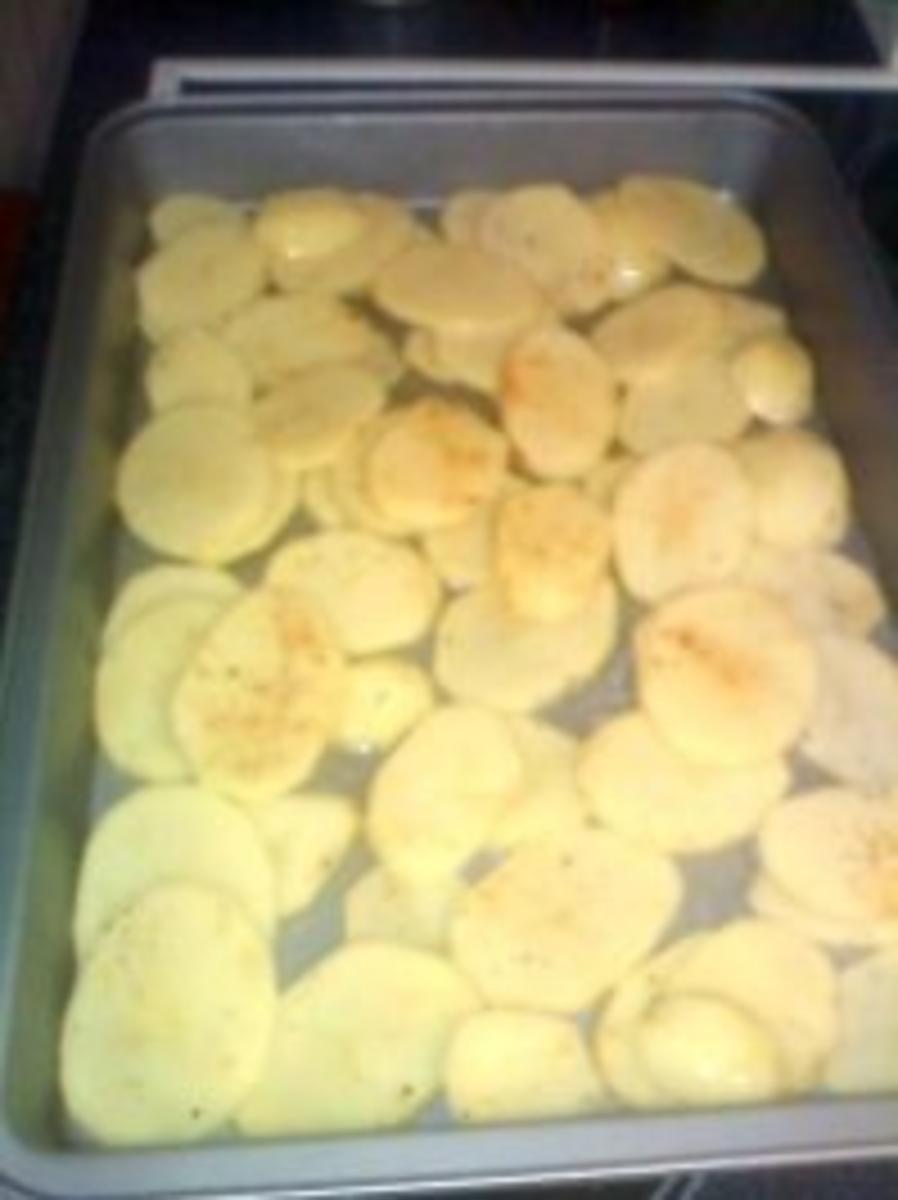 Scharfe Hähnchenflügel auf Kartoffel-Kirschtomatenbett - Rezept