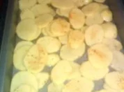 Rezept: Scharfe Hähnchenflügel auf Kartoffel-Kirschtomatenbett Scharfe Hähnchenflügel auf Kartoffel-Kirschtomatenbett - Rezept