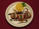 Schweinemedaillons in Parmaschinken an Kartoffel-Knoblauchpüree - Rezept
