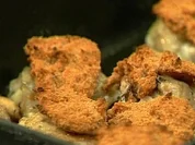 Hühnerkeulen mit Tomatenkruste - Rezept