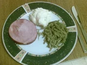 Saure Bohnen mit Kassler und Püree - Rezept