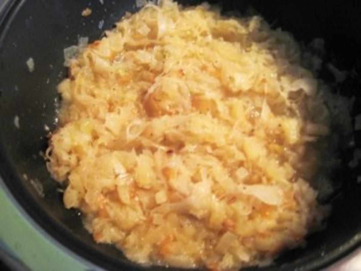 Sauerkraut mit Speck und Zwiebel - Rezept