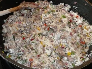 Paprikaschoten gefüllt mit Hack und Reis in Tomatensoße - Rezept - Bild Nr. 4