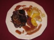 Kalbshaxe im Zwiebelbett mit Salzkartoffeln und Blumenkohl - Rezept