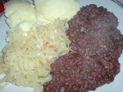 Grützwurst mit Quarkkartoffeln und Sauerkraut - Rezept