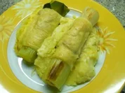 Lauchstangen im Käse- Schinkenmantel auf Kartoffelpüree - Rezept