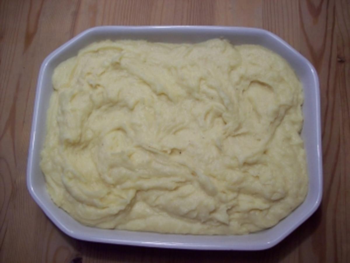 Kartoffel-Käse-Püree mit Speck-Würstchen - Rezept