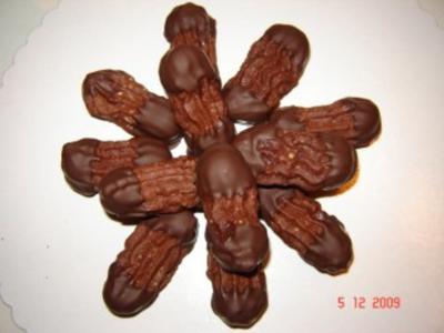 Rezept: Weihnachtsplätzchen : Nougatstangen Weihnachtsplätzchen : Nougatstangen - Rezept