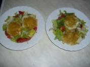 Panierte Mozzarella-Medaillons auf Salat - Rezept
