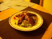 Knusprige Hühnerstreifen auf buntem Salat - Rezept