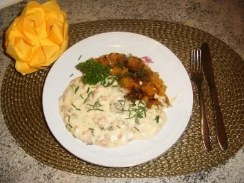 Spagettikürbis mit Käse-Sahnesoße - Rezept