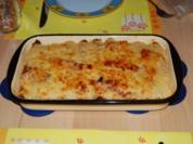 gefüllte Palatschinken mit Käse überbacken - Rezept