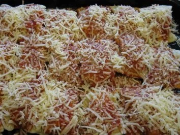 Maultaschen mit Majoran-Oregano-Tomatensoße überbacken - Rezept - Bild Nr. 7