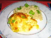 Curryschnitzel mit Ananas und Mango - überbacken an Bulgur - Rezept