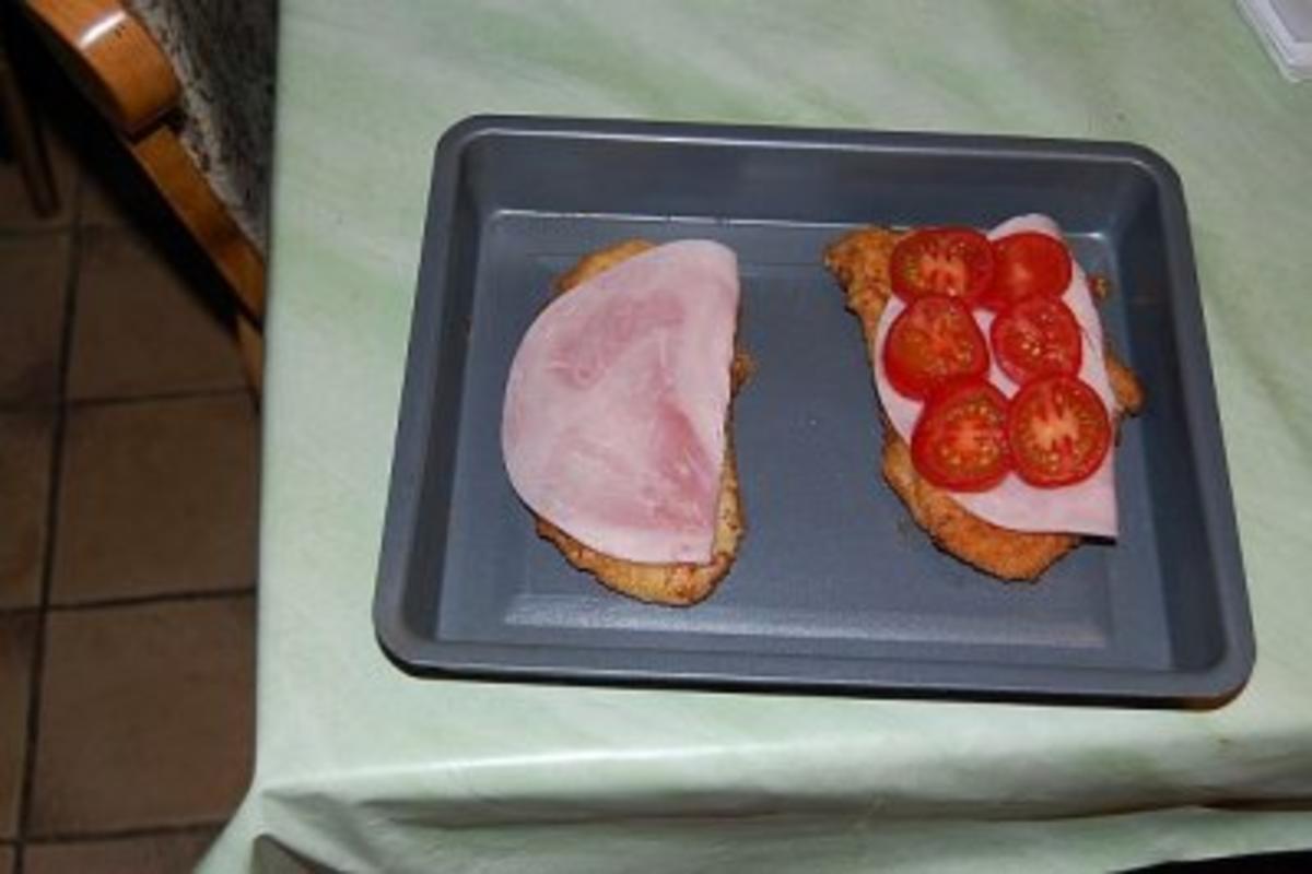 Putenschnitzel mit Schinken Tomaten und Käse überbacken - Rezept - Bild Nr. 5
