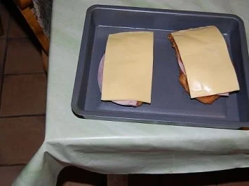 Putenschnitzel mit Schinken Tomaten und Käse überbacken - Rezept - Bild Nr. 6