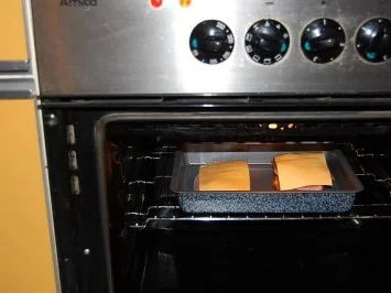 Putenschnitzel mit Schinken Tomaten und Käse überbacken - Rezept - Bild Nr. 7