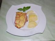 Putenschnitzel mit Schinken Tomaten und Käse überbacken - Rezept