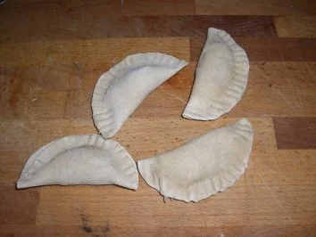 Tiroler Schlutzkrapfen mit Krautfüllung dazu Krensauce/Schaum - Rezept