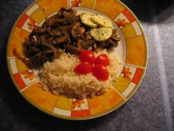 Schnelle Champignonpfanne mit Kräuterbutter - Rezept