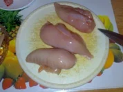 Pikante Hühnchenbrustsreifen an glasierten Tomaten mit Reis - Rezept